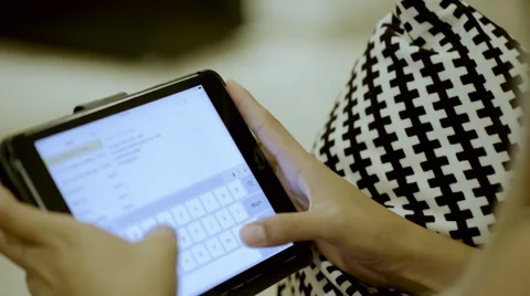 Female working on tablet Stock Footage 54938051