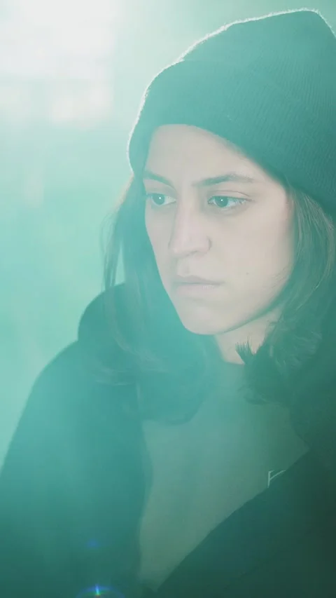 Female young hacker working on computer in dark room programming code Stock Footage 316792614