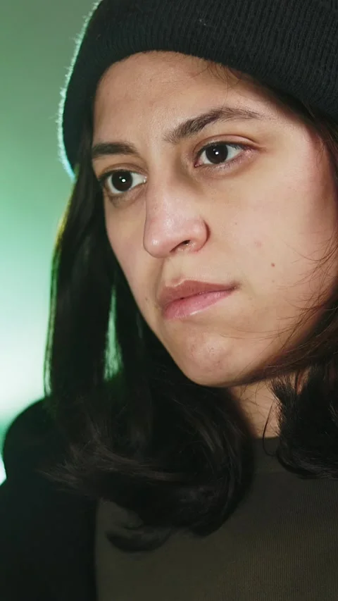 Female young hacker working on computer in dark room programming code Stock Footage 316850037