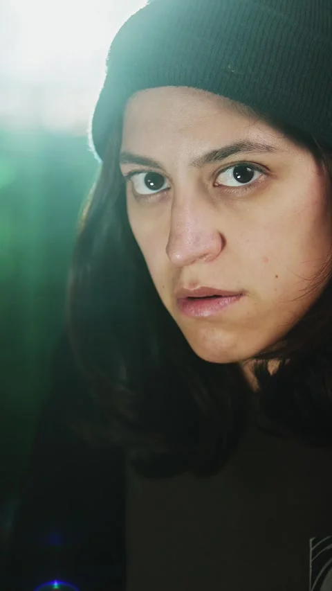 Female young hacker working on computer in dark room programming code Stock Footage 316850069