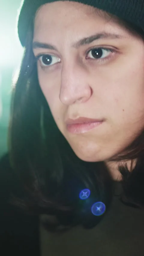 Female young hacker working on computer in dark room programming code Stock Footage 316850077