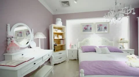 Females bedroom with many furniture and pink color wallpapers Stock Footage