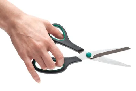 Feminine hand with scissors Stock Photos