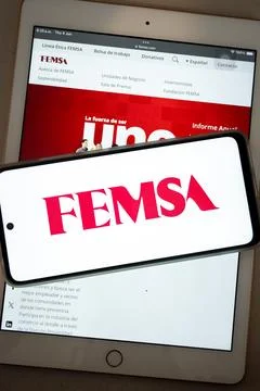 Femsa corporation branding on smartphone Fotos de archivo