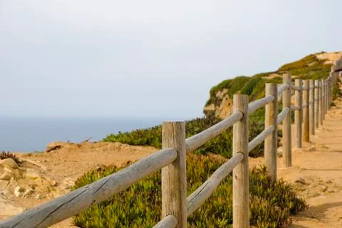 Fence above the cliff Stock Photos