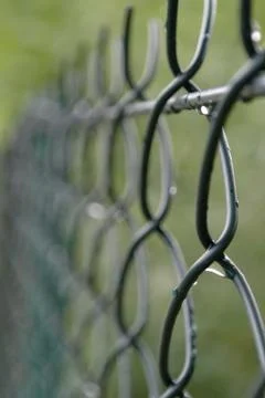 Fence after rain Stock Photos