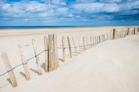 Fence along Holkham beach Stock Photos