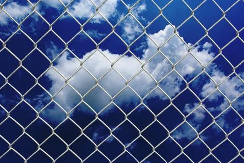 Fence and Fluffy Clouds Stock Illustration