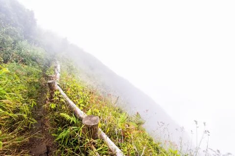 Fence and pathway on mountain Stock Photos