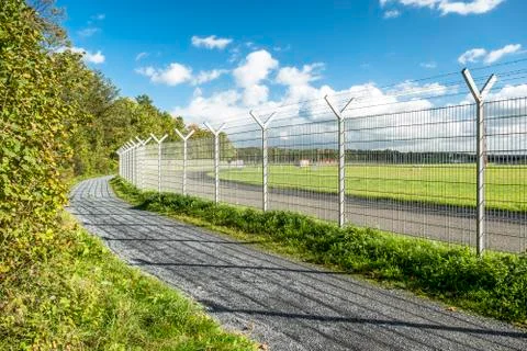 Fence around restricted area Stock Photos