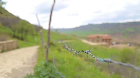 Fence with barbed wire Stock Footage 91493765