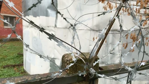 Fence with barbed wire Stock Footage 120684249