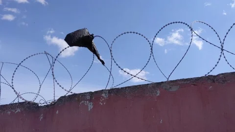 Fence with barbed wire Stock Footage 154035783