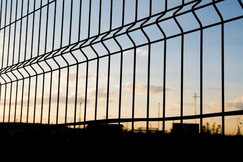 Fence with barbed wire. Stock Photos