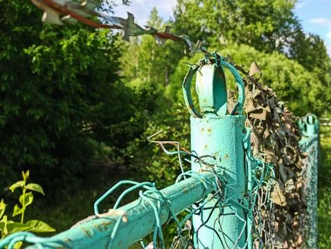 Fence With A Barbed Wire Stock Photos