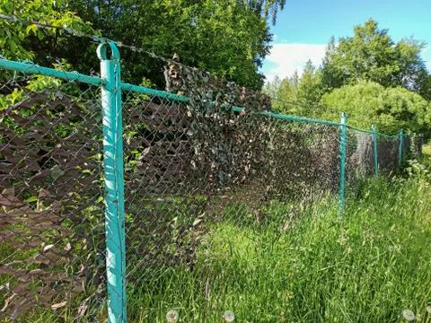 Fence With A Barbed Wire Stock Photos