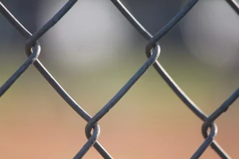 Fence at the baseball field Stock Photos
