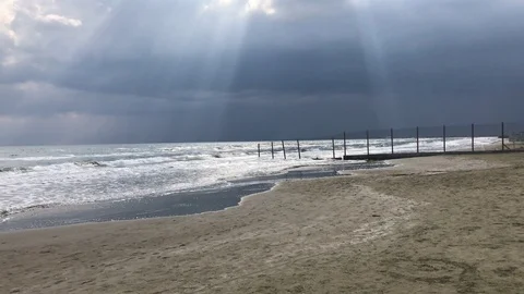 Fence at the beach against cloudy sky Stock Footage 98150420