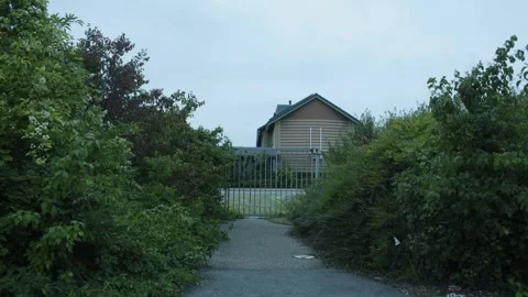 Fence In Between The Bushes Stock Footage 247141514