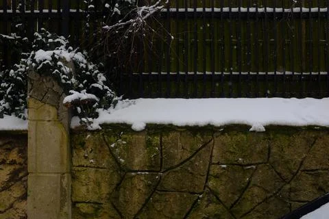 Fence covered by snow Stock Photos