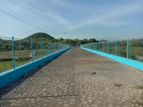Fence on a dam Stock Photos