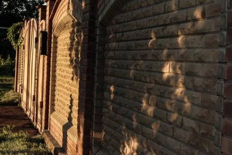 The fence of the decorative stone. Side view. Fotos de archivo