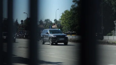 Fence In Foreground, Traffic In Background Stock Footage 91699714
