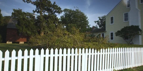 Fence in front of a storey house Stock Footage 103488871