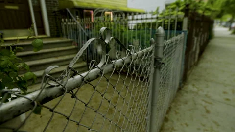 Fence in front of townhouse Stock Footage 277424063