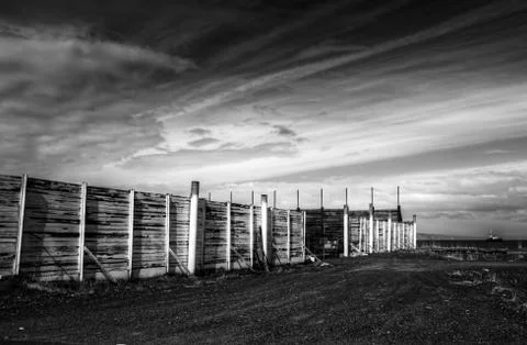 Fence by the harbor Stock Photos