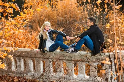 On fence iscouple Stock Photos