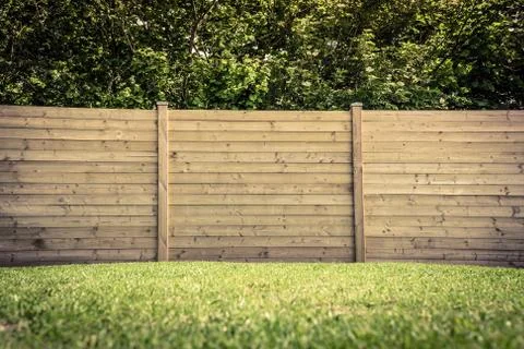 Fence on lawn Stock Photos