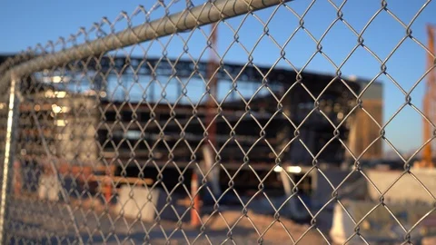 Fence line on construction site Stock Footage 118414213