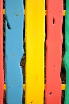 Fence made of colorful planks Stock Photos