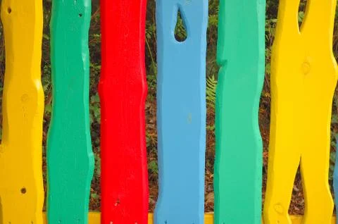 Fence made of colorful planks Stock Photos