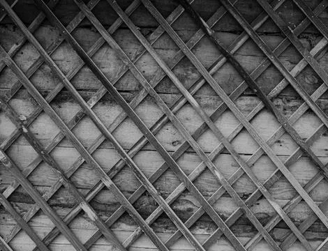 Fence made of tree branches boards Stock Photos