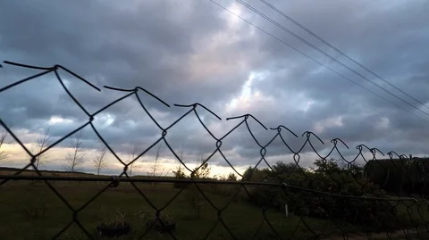 Fence mesh stretched along the perimeter. 11 Video stock 100767600