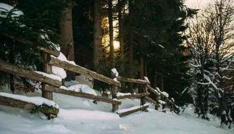 Fence in the mountains at sunset Stock Photos