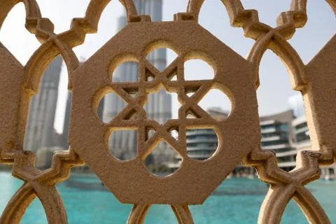 Fence with a pattern on the promenade of Dubai. Stock Photos