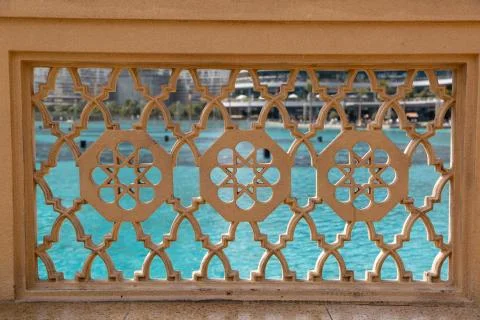 Fence with a pattern on the promenade of Dubai. Stock Photos
