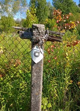 A fence post with a target printed on paper for sport shooting Stock Photos
