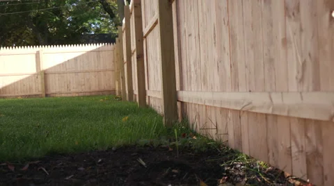 Fence Rise Up to Close Up of Post Stock Footage 68778328