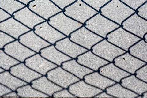 Fence shadow Stock Photos