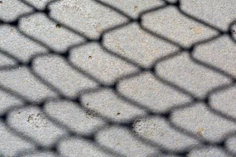 Fence shadow Stock Photos