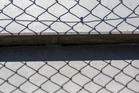 Fence shadow Stock Photos