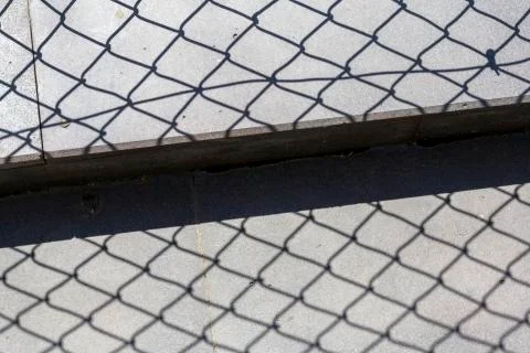 Fence shadow Stock Photos