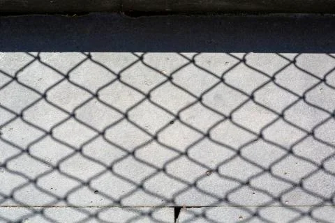 Fence shadow Stock Photos