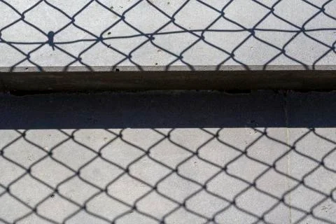 Fence shadow Stock Photos