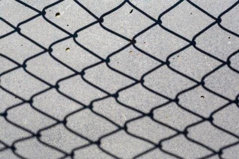 Fence shadow Stock Photos