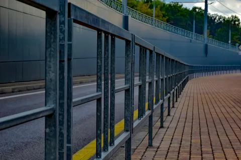 Fence, sidewalk Stock Photos